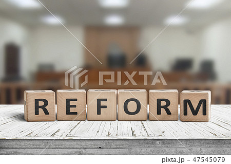 Reform sign on a desk with a blurry background Reform sign on a desk with a blurry background 47545079