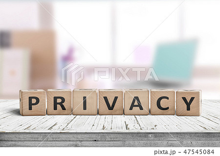 Privacy sign on a wooden table in a bright room Privacy sign on a wooden table in a bright room 47545084