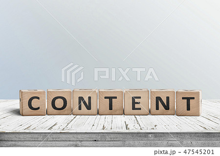 Content sign made of wood on an old table 47545201