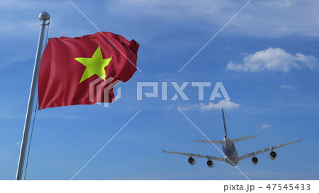 Commercial airplane landing behind waving Vietnamese flag. Travel to Vietnam conceptual 3D rendering 47545433