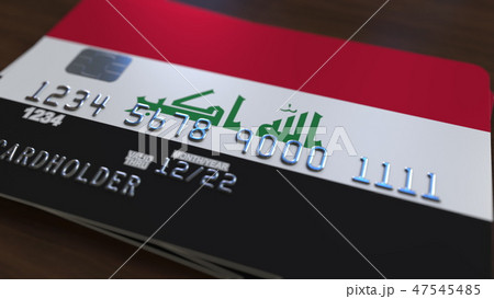 Plastic bank card featuring flag of Iraq. Iraqi national banking system related 3D rendering 47545485