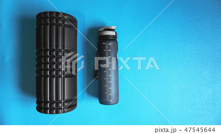 Foam Roller Gym Fitness Equipment Blue background self Myofascial Release 47545644