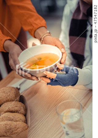 Top view of a bowl with chicken broth Top view of a bowl with chicken broth 47547182