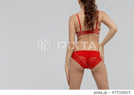 Beautiful sexy slim woman on white background Beautiful sexy slim woman on white background 47550925