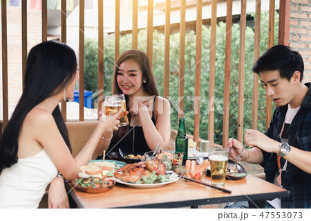 Group of asian people cheering beer at restaurant 47553073