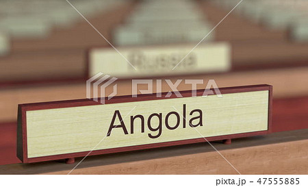 Angola name sign among different countries plaques at international organization. 3D rendering 47555885