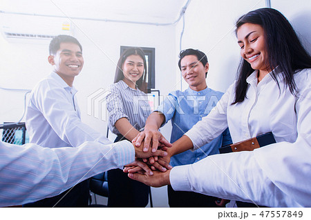 business meeting concept, business team join hands after working business meeting concept, business team join hands after working 47557849