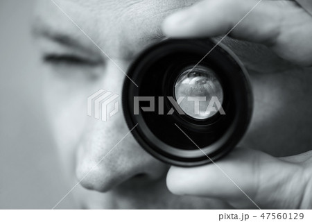 The man with a lens. 47560129