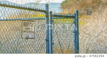 Keep Out sign on mesh fence in San Clemente CA Keep Out sign on mesh fence in San Clemente CA 47562264