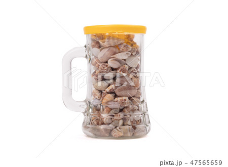 Old jar filled with small seashells Old jar filled with small seashells 47565659