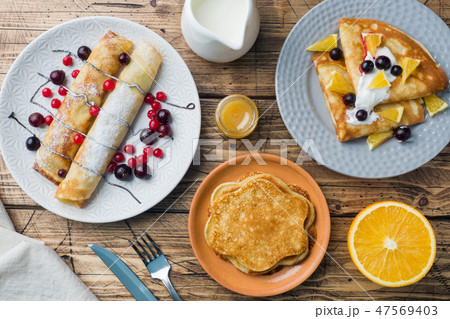 Different types of pancakes with berries pancake,  47569403