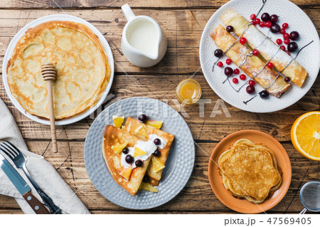 Different types of pancakes with berries pancake,  47569405