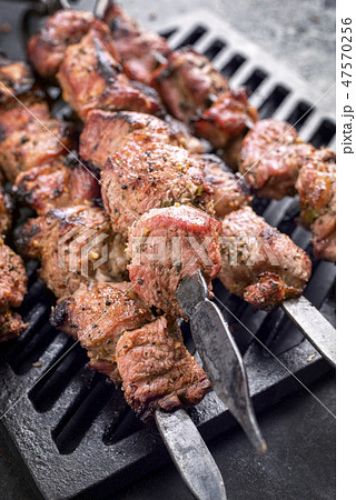 Traditional Russian shashlik on a barbecue skewer Traditional Russian shashlik on a barbecue skewer 47570256