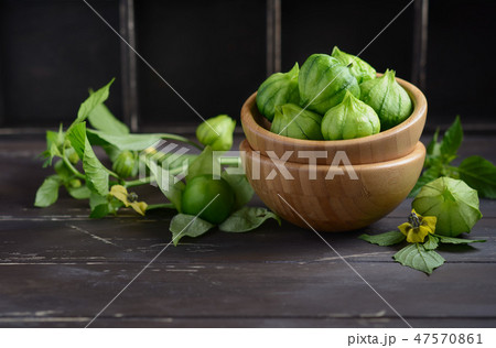 Fresh organic green tomatillos. Fresh organic green tomatillos. 47570861