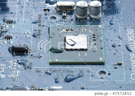 Electrical circuit mother board with water drops 47572652