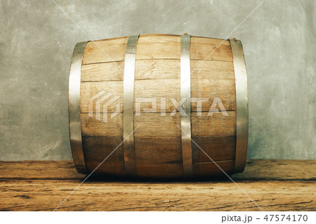 Wooden barrel and worn old table of wood. Wooden barrel and worn old table of wood. 47574170