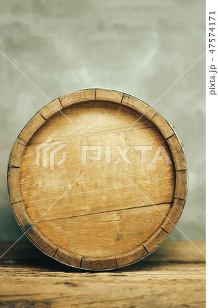 Wooden barrel and worn old table of wood. 47574171