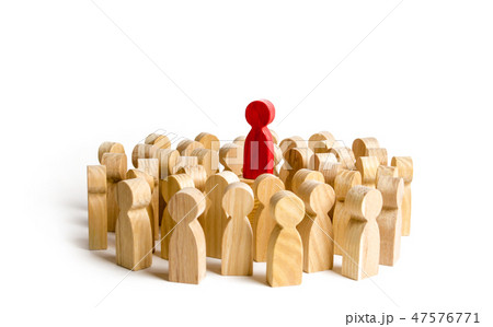 Red figure leader stands at the head of the crowd 47576771