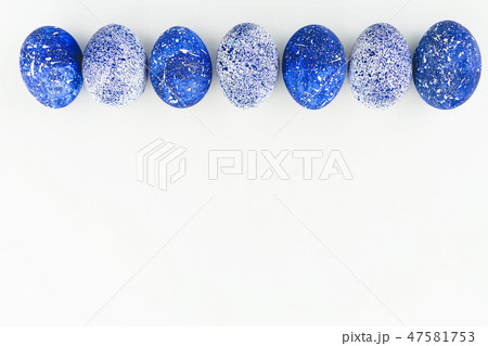 Speckled Easter Eggs with copy space on white Speckled Easter Eggs with copy space on white 47581753