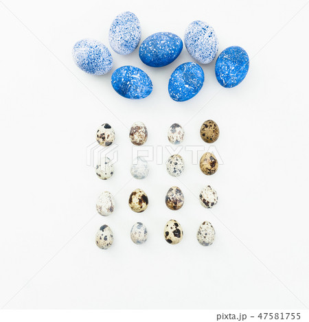 Speckled Easter Eggs with quail eggs on white Speckled Easter Eggs with quail eggs on white 47581755