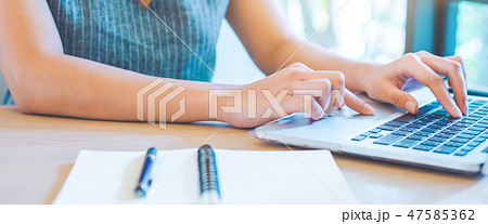 Business woman hand working with a laptop. Business woman hand working with a laptop. 47585362