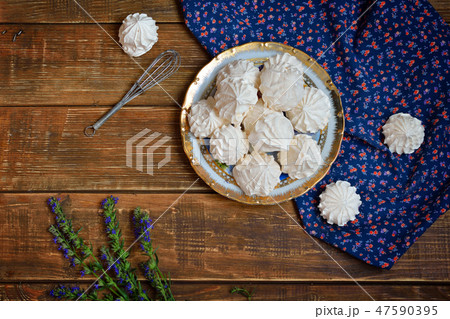 A bowl of home-made meringues 47590395