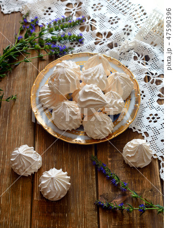 A bowl of home-made meringues 47590396