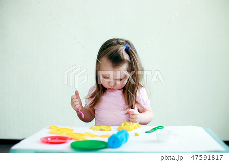 Children creativity. Kid sculpts from clay 47591817