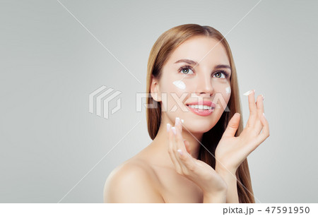 Young happy woman with healthy skin Young happy woman with healthy skin 47591950