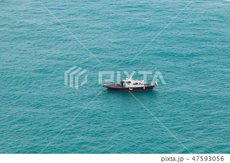 Small fishing motorboat boat goes slowly Small fishing motorboat boat goes slowly 47593056
