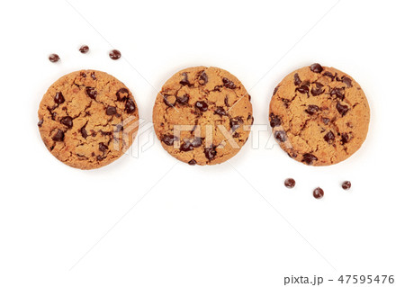 A photo of freshly baked chocolate chip cookies, shot from above on a white background 47595476