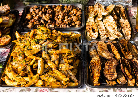 delicious vegetables grilling in open grill delicious vegetables grilling in open grill 47595837