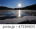 結氷した糠平湖と太陽 47599835