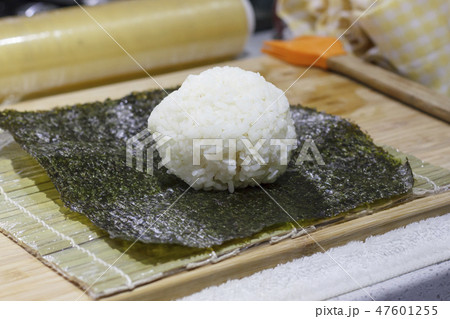 The process of making sushi and rolls The process of making sushi and rolls 47601255