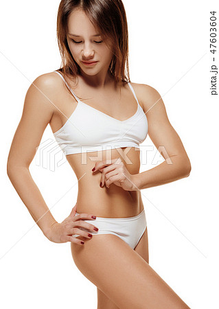 Perfect slim toned young body of the girl . 47603604