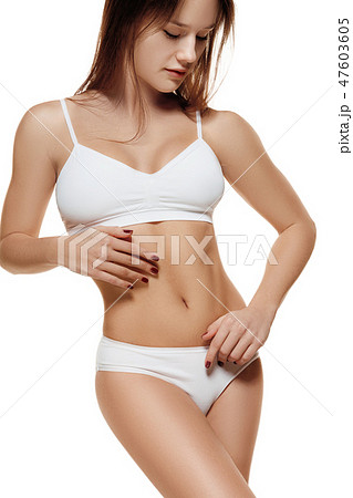 Perfect slim toned young body of the girl . 47603605