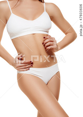 Perfect slim toned young body of the girl . Perfect slim toned young body of the girl . 47603606