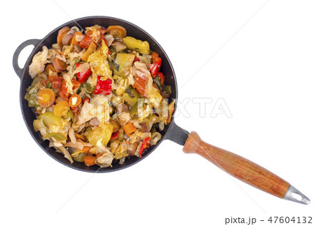Frying pan with steamed vegetables isolated Frying pan with steamed vegetables isolated 47604132