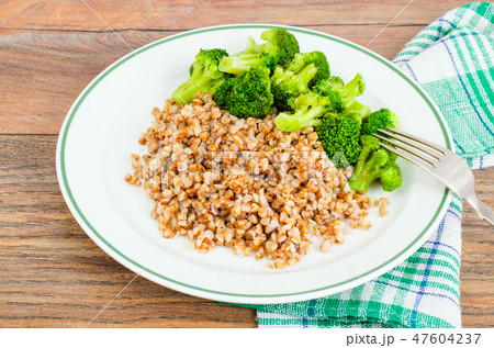 Vegetarian dish of buckwheat and broccoli Vegetarian dish of buckwheat and broccoli 47604237