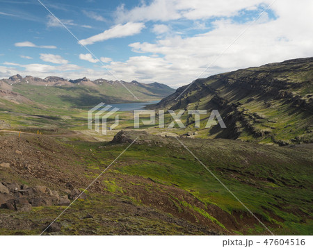 golden valley with a rocks river stream and mountains 47604516