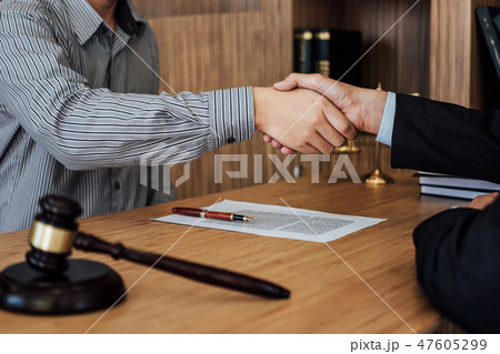 Shaking hands after good cooperation, Businessman handshake male 47605299
