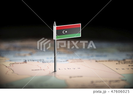 Libya marked with a flag on the map 47606025