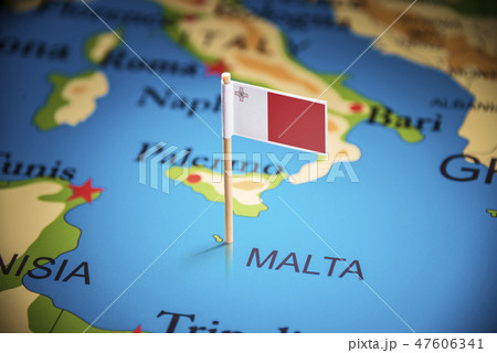 Malta marked with a flag on the map Malta marked with a flag on the map 47606341
