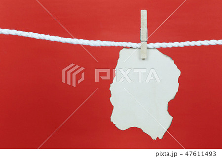 Empty old note paper hang on the clothesline and have copy space with red background. Empty old note paper hang on the clothesline and have copy space with red background. 47611493