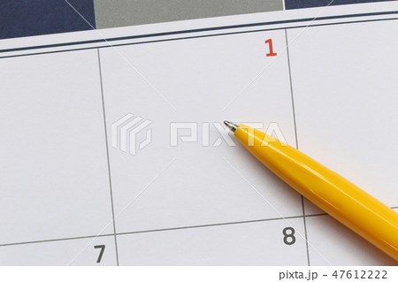 Yellow Pen point to empty space on the calendar background. Yellow Pen point to empty space on the calendar background. 47612222