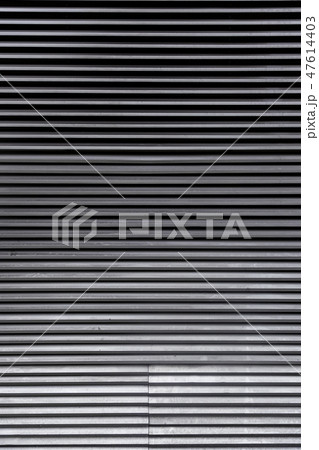 Rusty metal door closed Rusty metal door closed 47614403