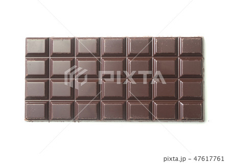 Closeup of milk chocolate bar on white background Closeup of milk chocolate bar on white background 47617761
