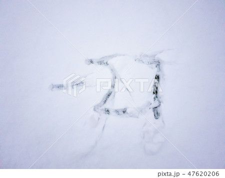 Temperature of -27 written in the freshly fallen snow Temperature of -27 written in the freshly fallen snow 47620206