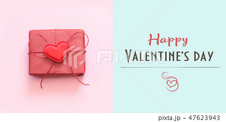 Happy Valentine's day card with red gift on blue. Happy Valentine's day card with red gift on blue. 47623943