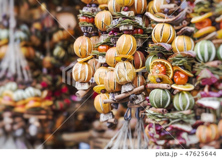 Christmas decorations made with dried fruits. 47625644